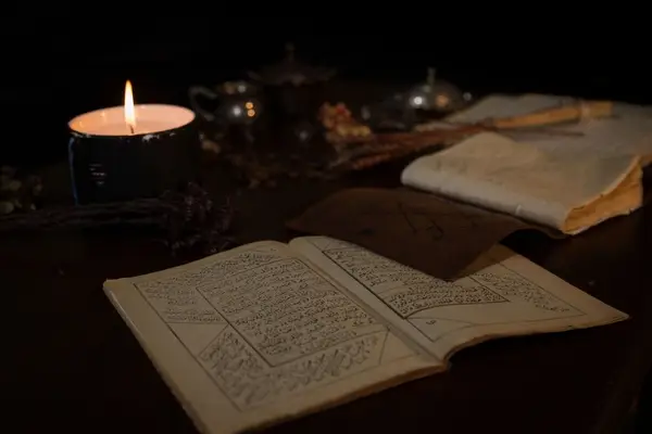 صورة تحتوي على كتاب و شمعة 
شيخ روحاني في السويد